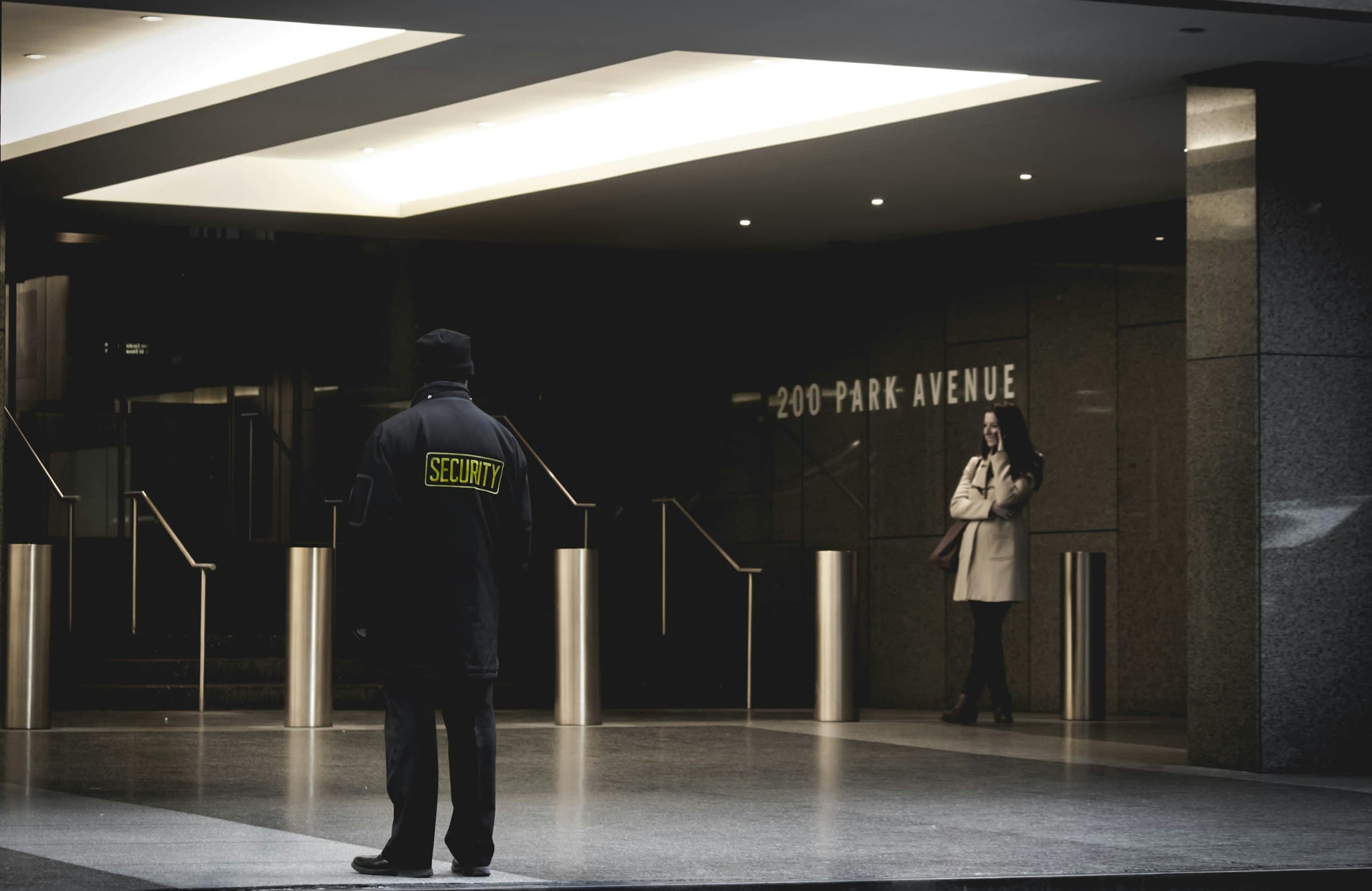 Security officer at a building entrance